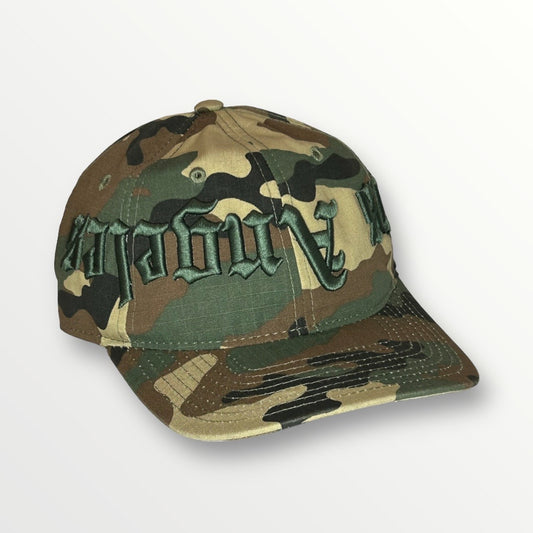This is a green camouflage baseball cap with 3-D embroidery of "Los Angeles" written in LA Times-like font.