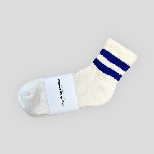 The Mono Stripe Quarter Crew for men is a white sock with royal blue stripes on the shaft. It hits just above the ankle so you get the look of the tube sock without it shortening the leg. 
